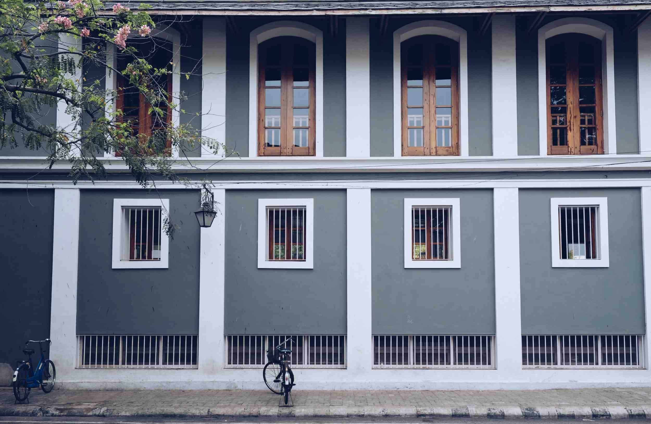 Outdoor building with white windows